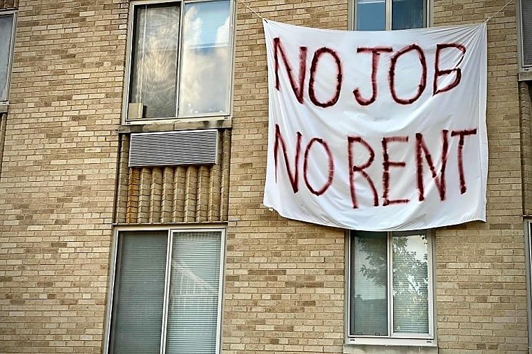No job No Rent, a banner hanging on the building due to not any job in America