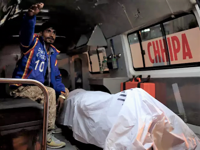 The killed man taking away to the Hospital